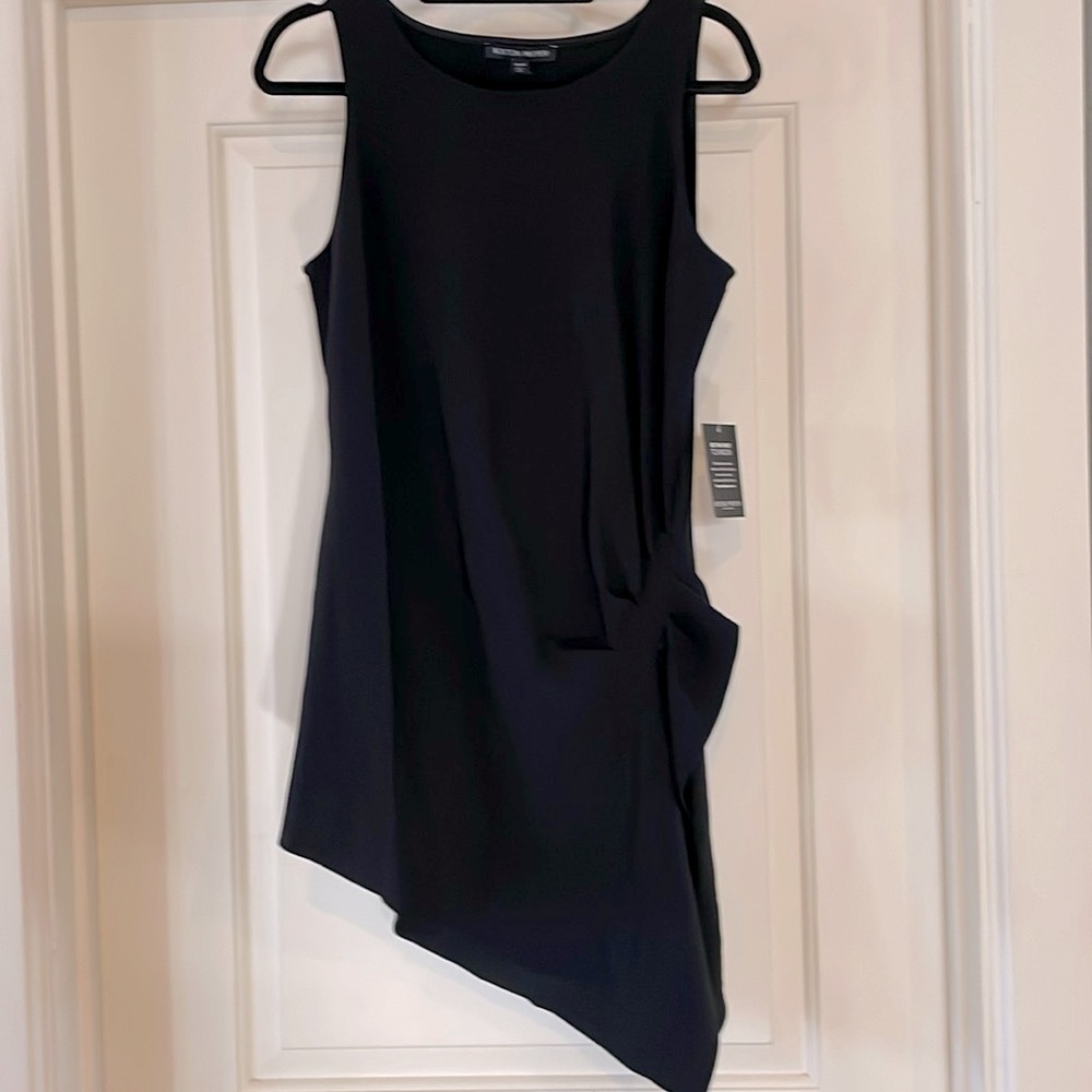 NWT Boston Proper longer length tank size medium. Asymmetrical hem.